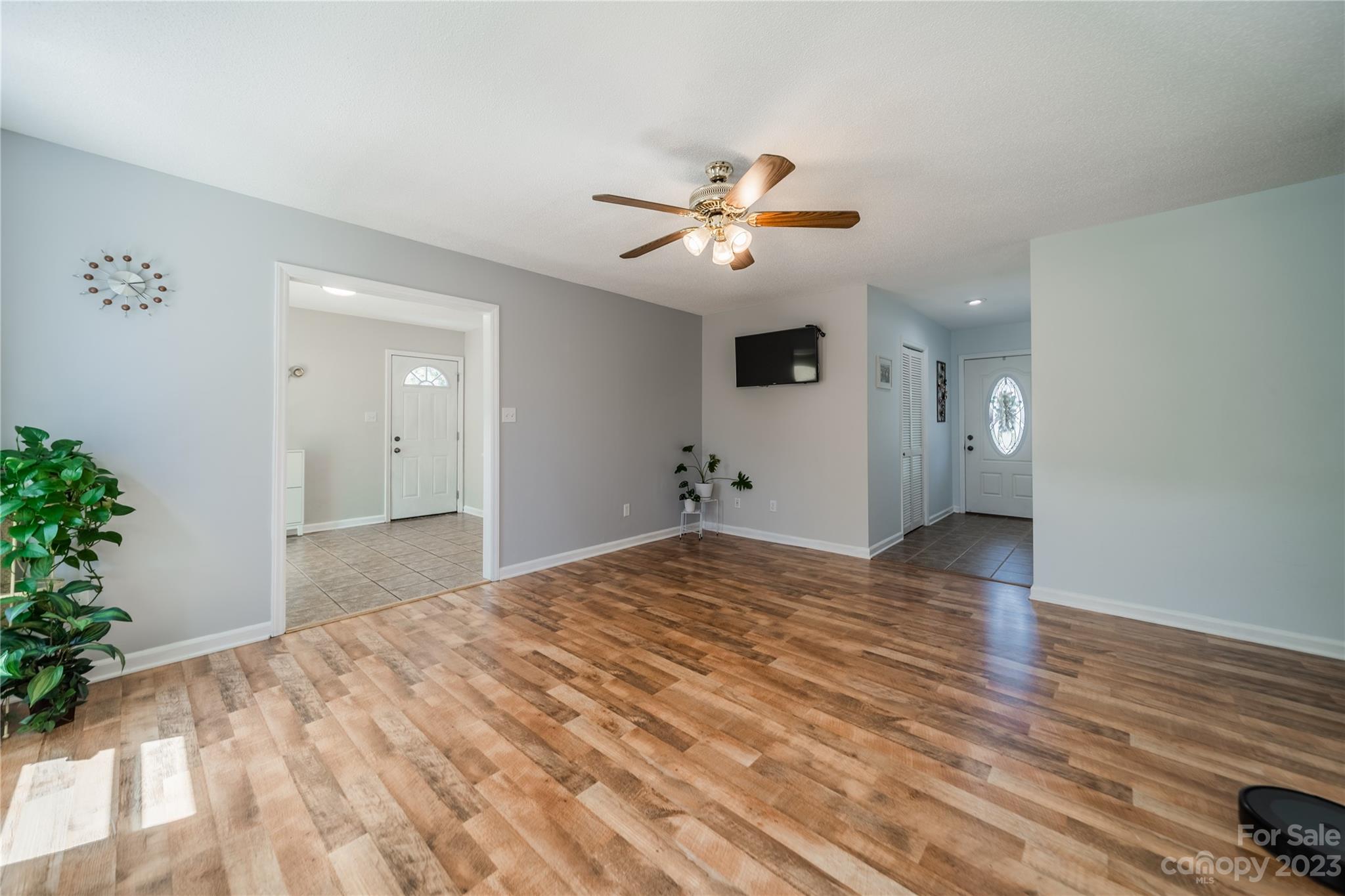 1585 Wimbleton Woods Drive Fort Mill, SC 29708 - Photo 16 of 41 a bedroom with a bed and a chandelier