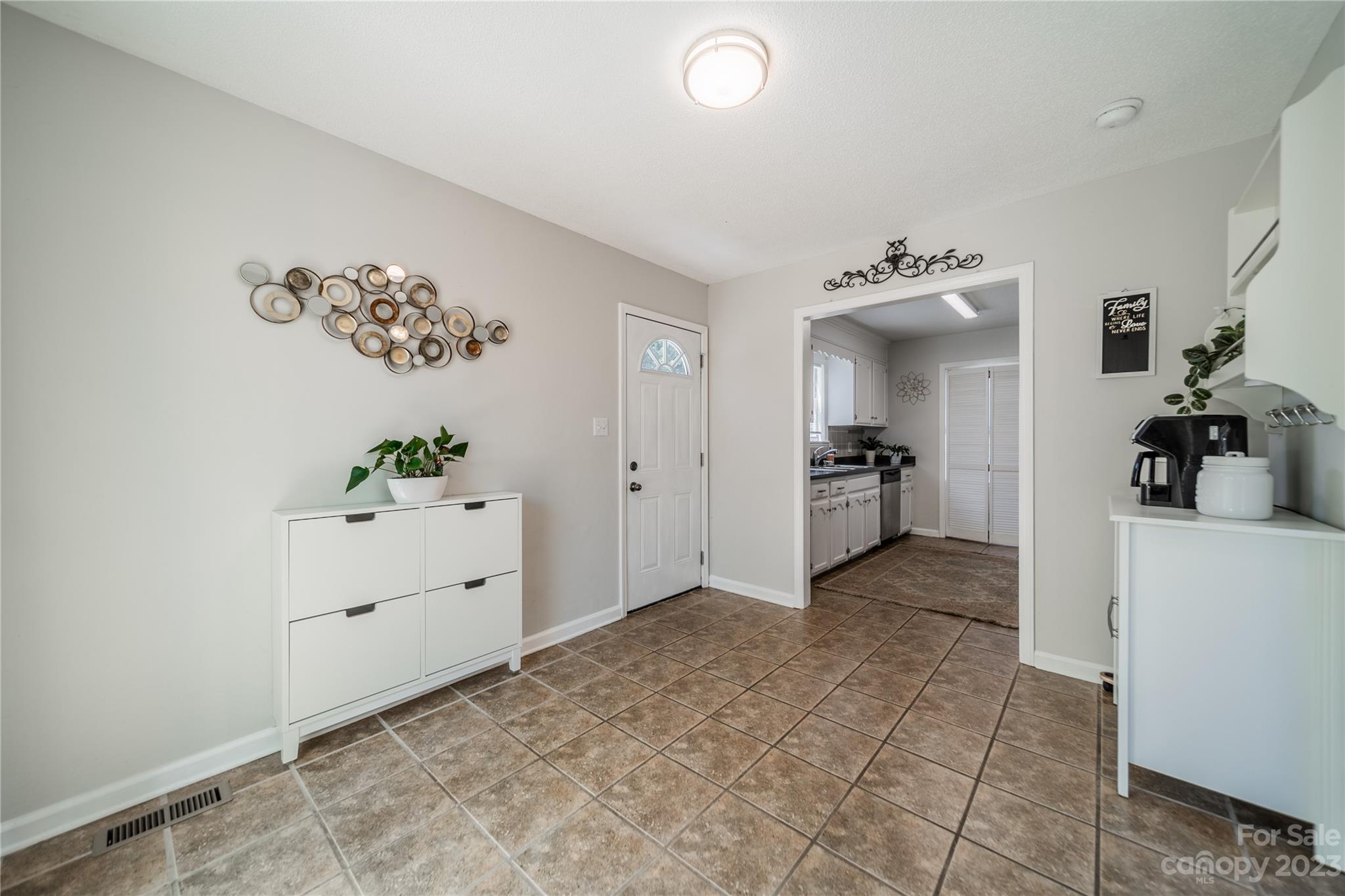 1585 Wimbleton Woods Drive Fort Mill, SC 29708 - Photo 17 of 41 a view of a hallway with closet and wooden floor