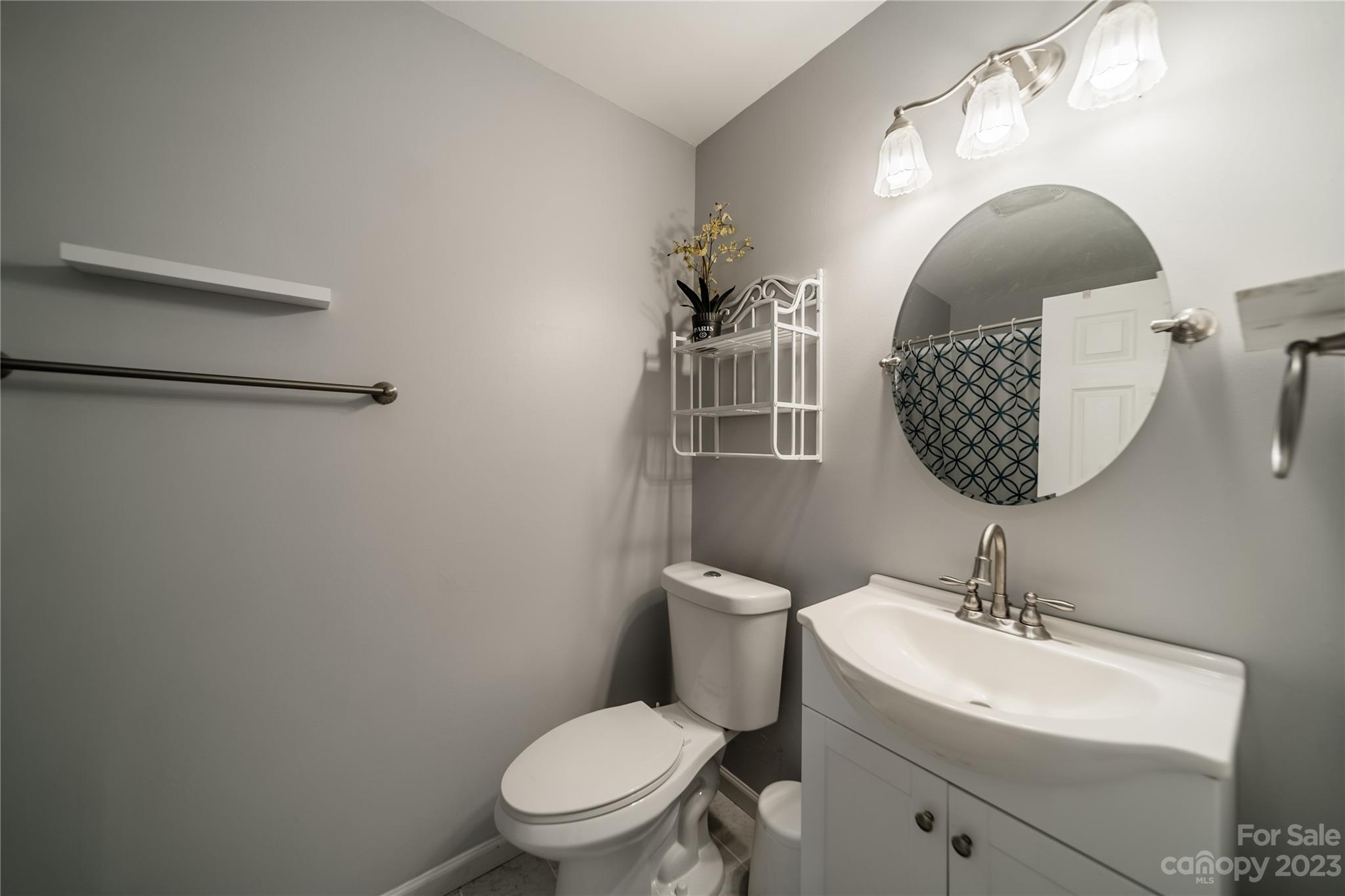 1585 Wimbleton Woods Drive Fort Mill, SC 29708 - Photo 24 of 41 a bathroom with a toilet a sink and mirror