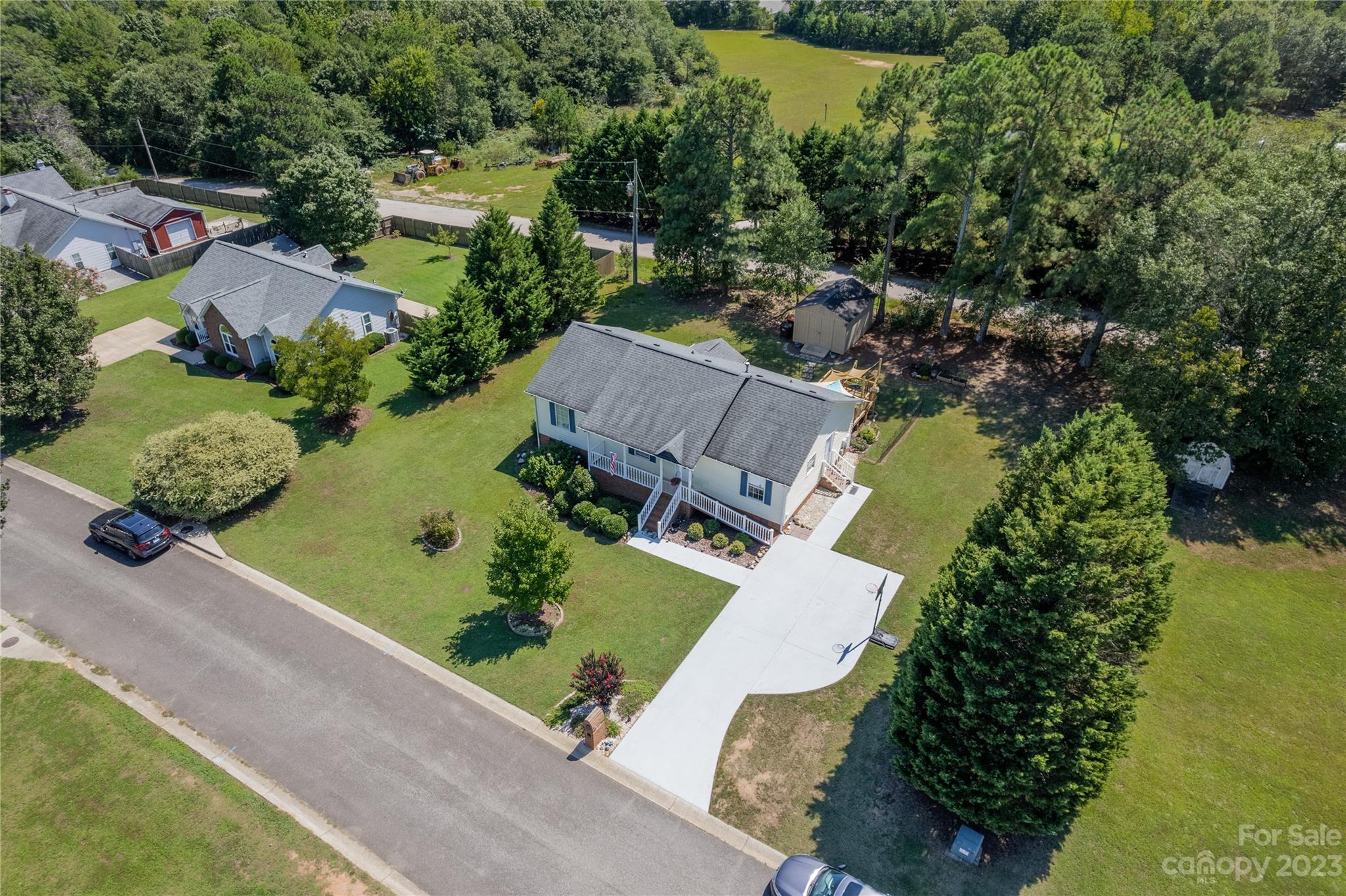 1585 Wimbleton Woods Drive Fort Mill, SC 29708 - Photo 36 of 41 an aerial view of a house with a garden and swimming pool