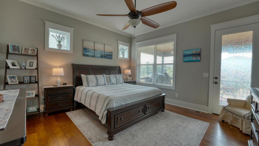 31 Elf School Road Hayesville, NC 28904 - Photo 34 of 59 a bed sitting in a spacious bedroom next to a window