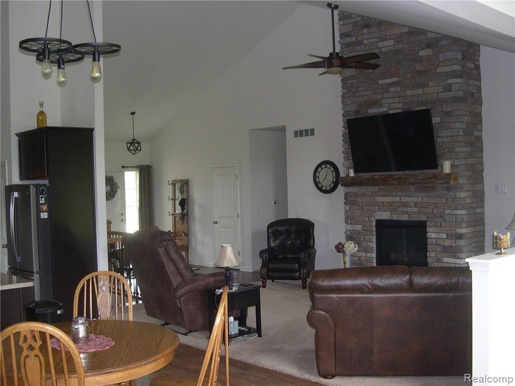 4170 Elevation Lane Howell, MI 48855 - Photo 14 of 36 VIEW OF GREAT ROOM FROM SUN ROOM