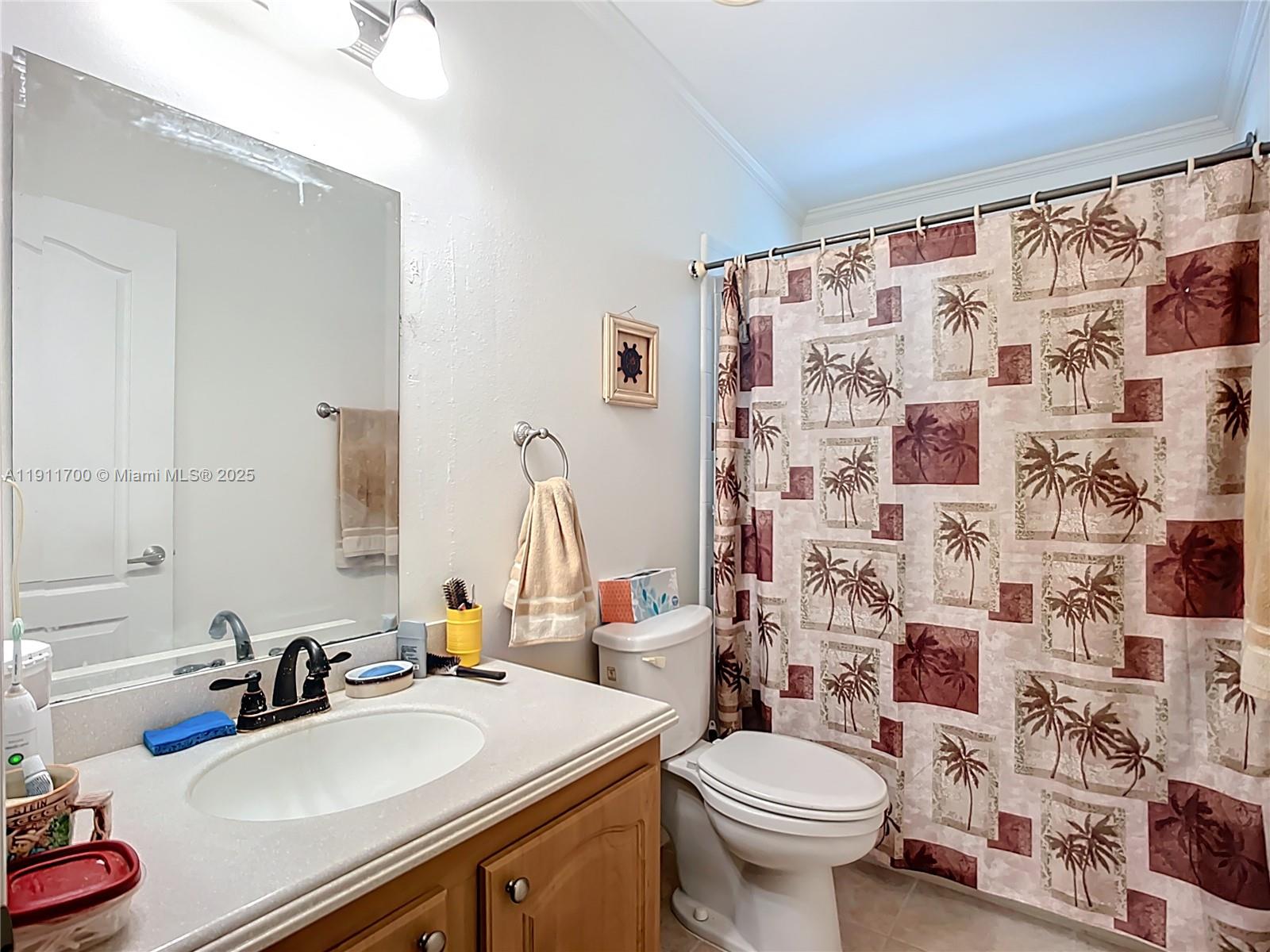 1432 Silver Lake Road LaBelle, FL 33935 - Photo 23 of 39 a bathroom with a sink toilet and shower