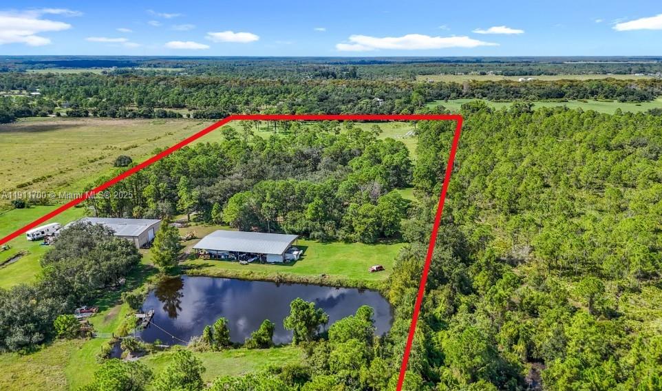 1432 Silver Lake Road LaBelle, FL 33935 - Photo 3 of 39 a view of an outdoor space and a lake view