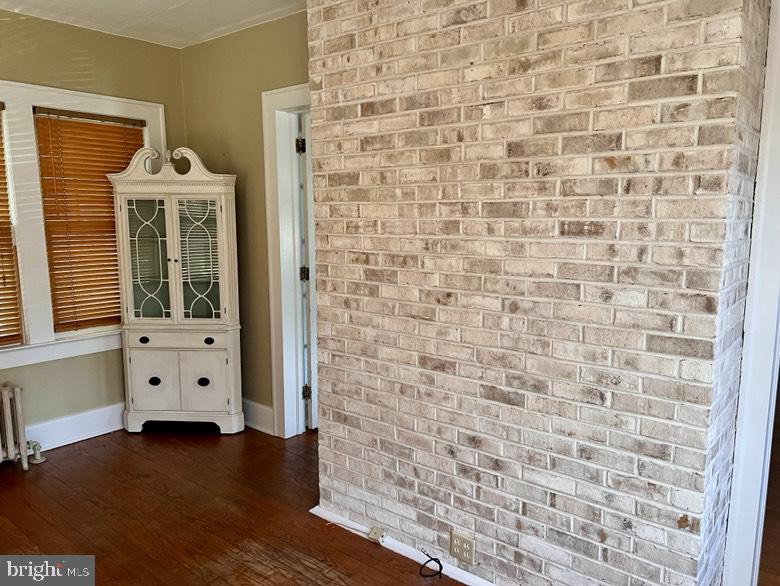 406 West Market Street Georgetown, DE 19947 - Photo 4 of 16 Charming brick wall in cozy space.