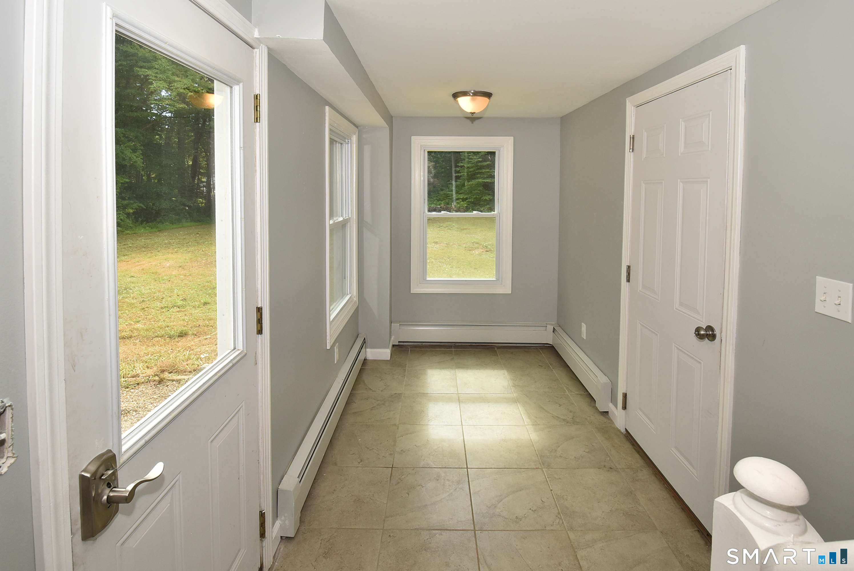 50 Doubleday Road Columbia, CT 06237 - Photo 17 of 29 Convenient mudroom entry with access to the garage, kitchen and back yard.