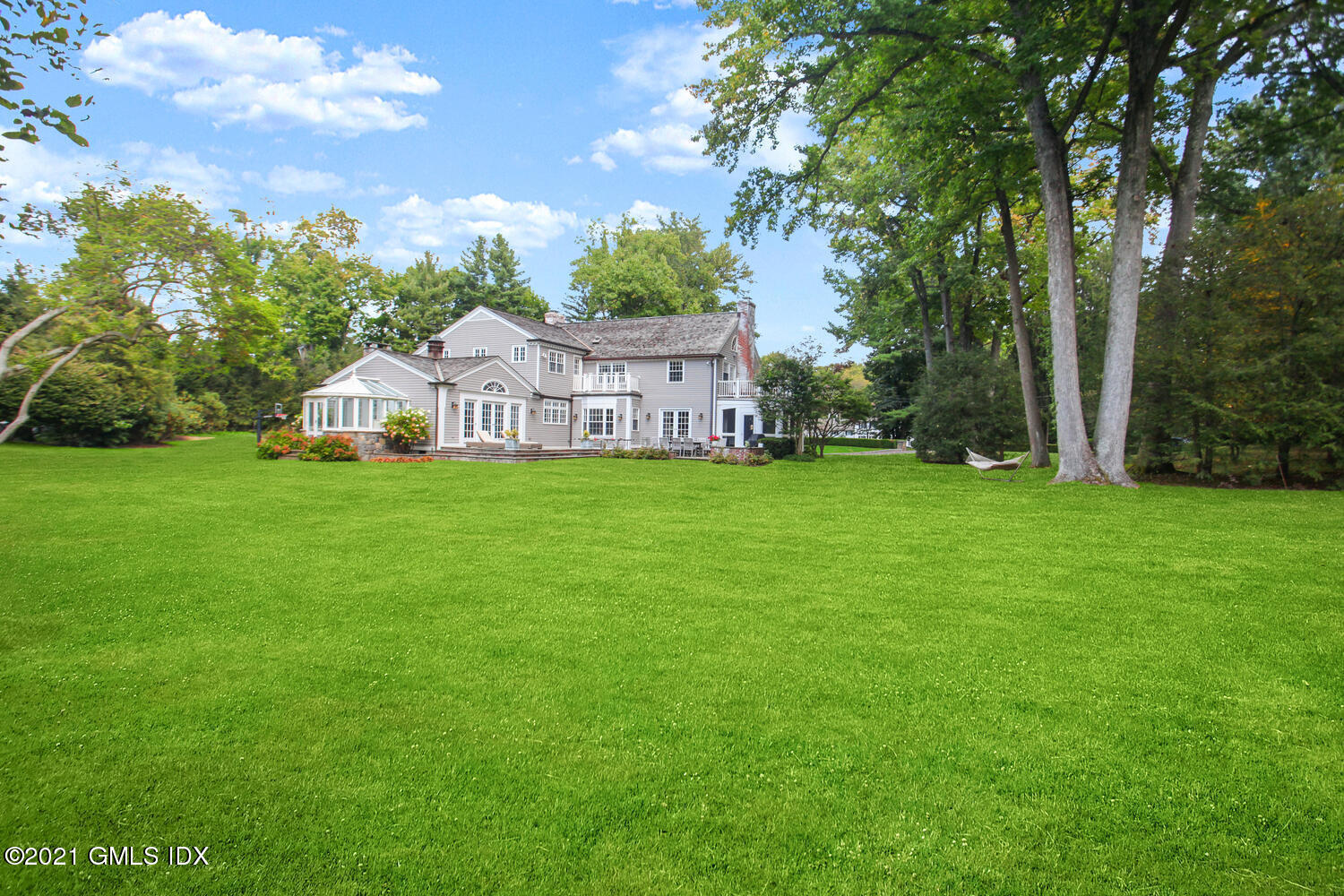 8 Cathlow Drive Riverside, CT 06878 - Photo 2 of 44 a view of a house with a big yard