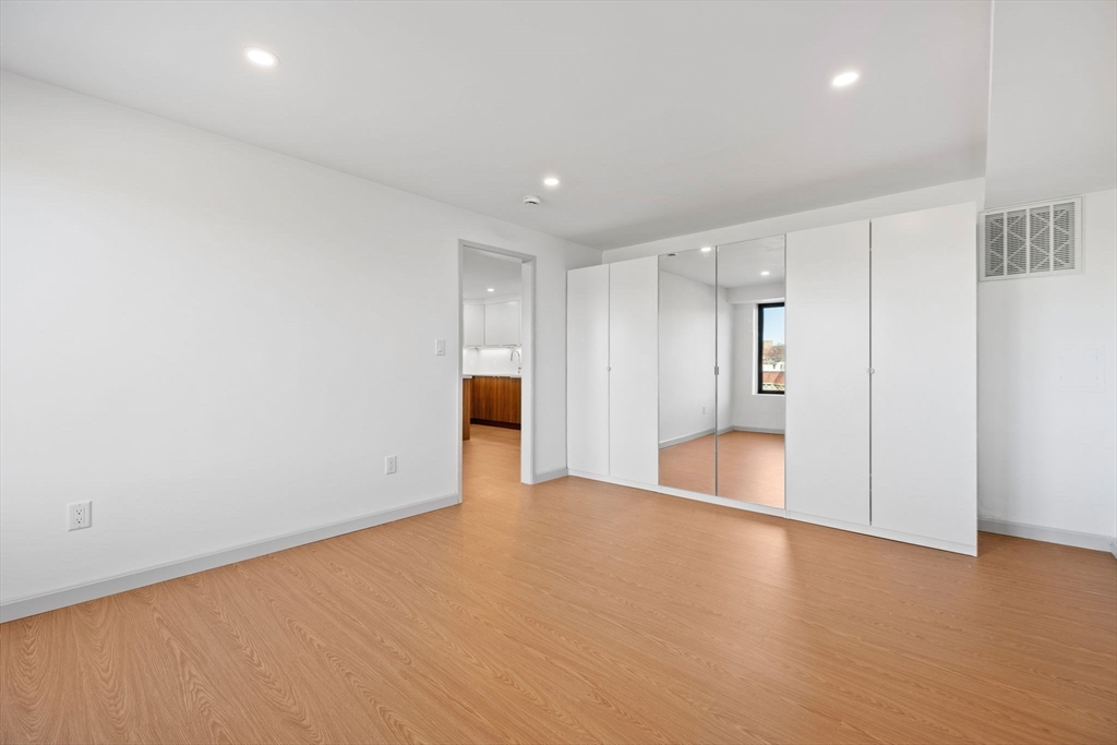 1243 Beacon Street, Unit 5A Brookline, MA 02446 - Photo 13 of 21 a view of empty room
