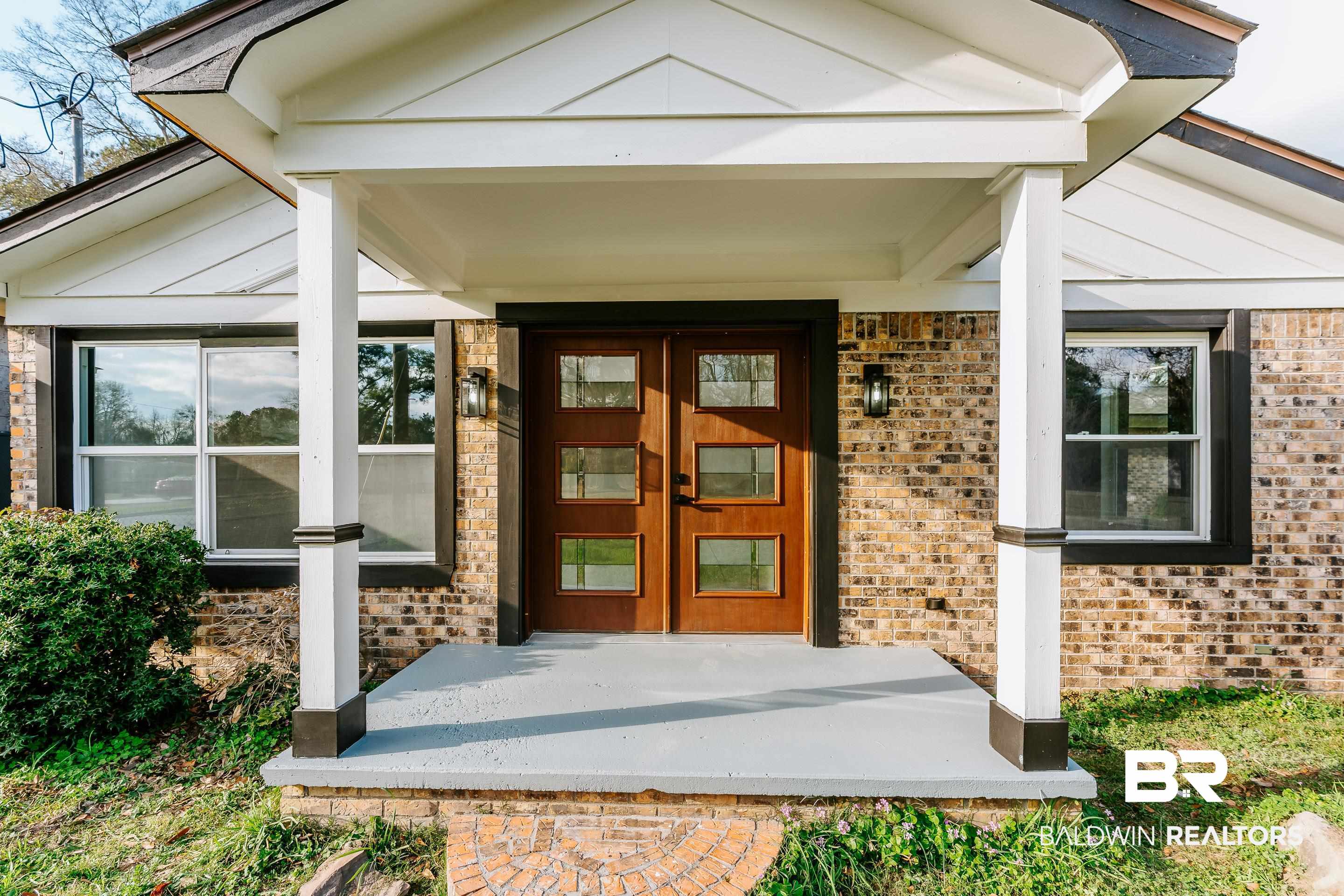 1190 Military Road Mount Vernon, AL 36560 - Photo 37 of 47 Entrance to property featuring french doors, a porch, and brick siding