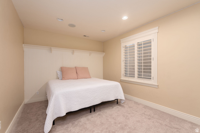 687 South 2080th Street East Springville, UT 84663 - Photo 32 of 149 Recessed lighting illuminates neutral-toned walls and plush carpeting