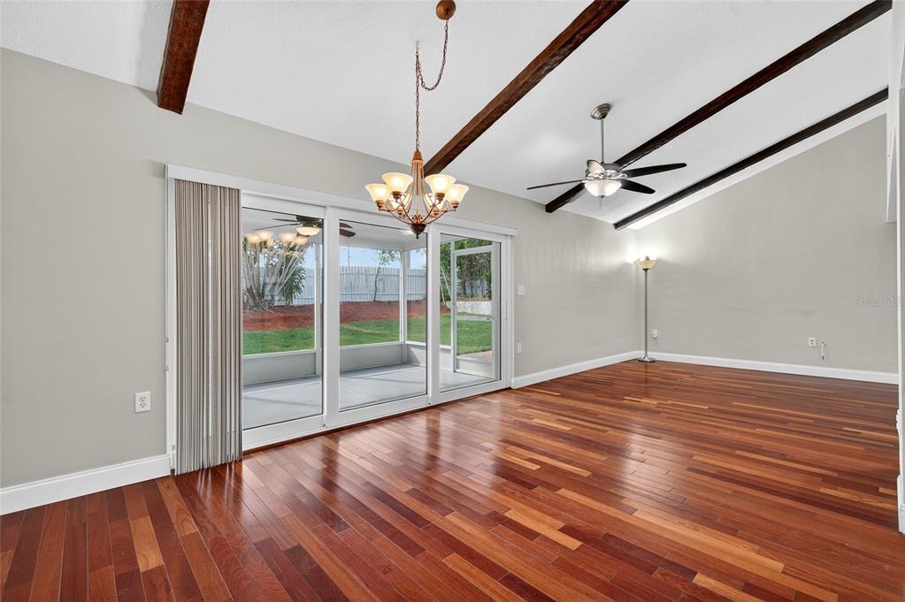 302 Leafwood Road Tarpon Springs, FL 34689 - Photo 17 of 55 a view of empty room with wooden floor