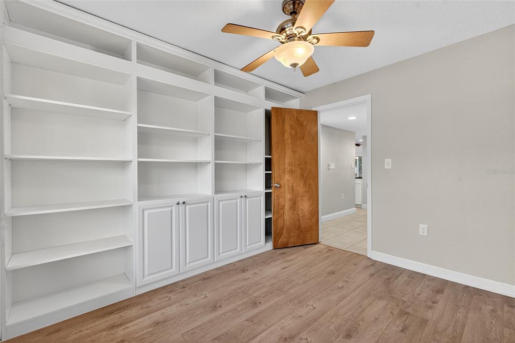 302 Leafwood Road Tarpon Springs, FL 34689 - Photo 27 of 55 a view of an empty room with a window