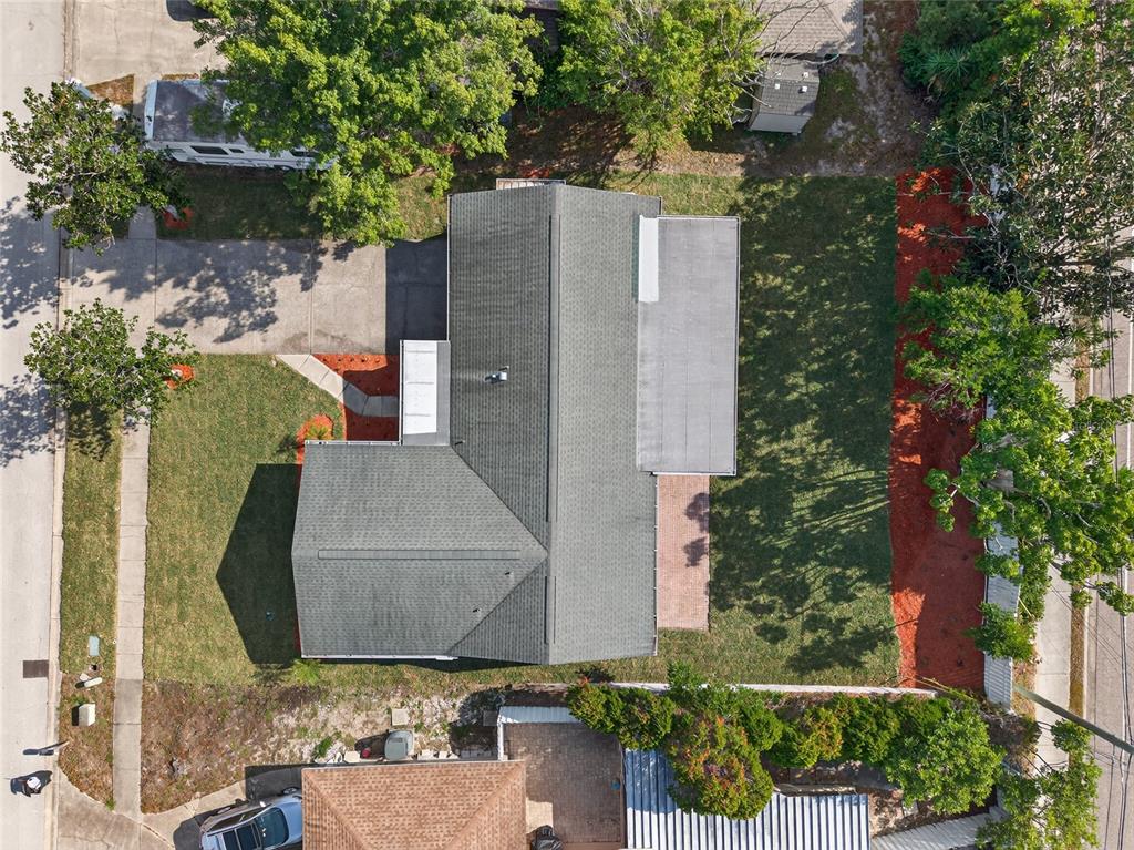 302 Leafwood Road Tarpon Springs, FL 34689 - Photo 50 of 55 an aerial view of a house with outdoor space