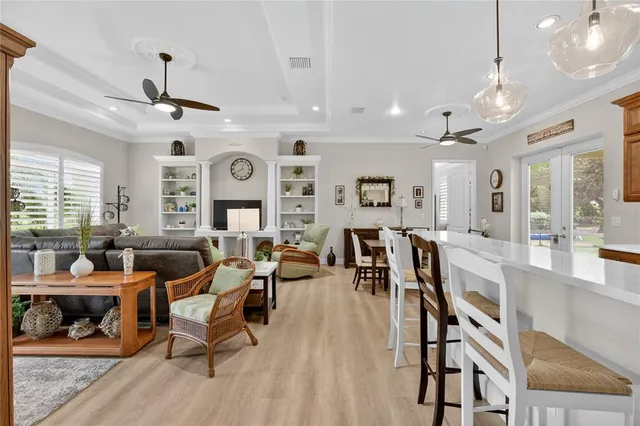 a bedroom with a large bed and furniture