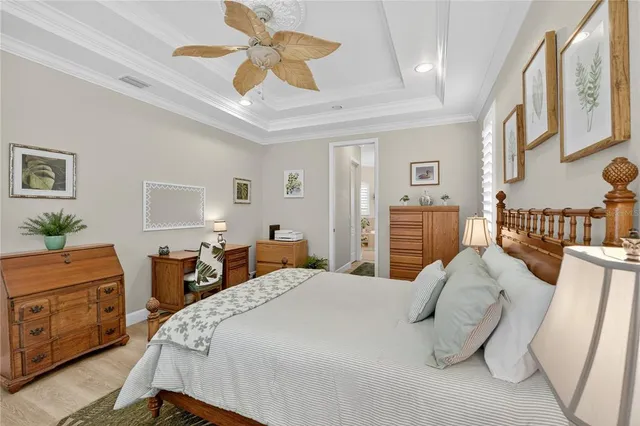 a bathroom with a granite countertop sink and a window