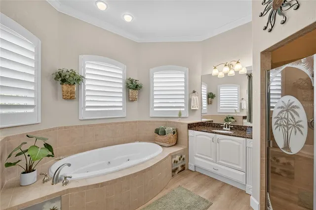 a bathroom with a granite countertop sink a toilet and a mirror
