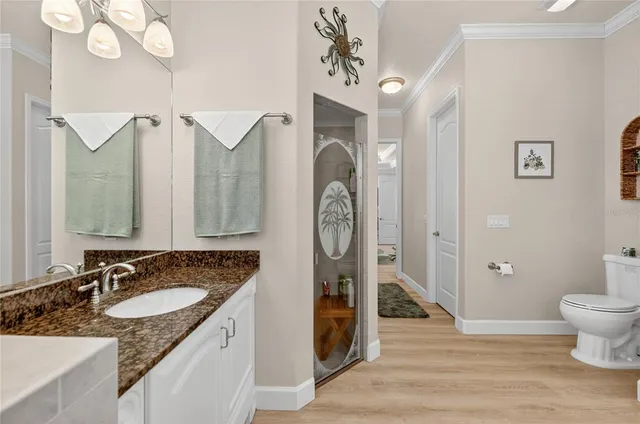 a kitchen with a sink stove and refrigerator