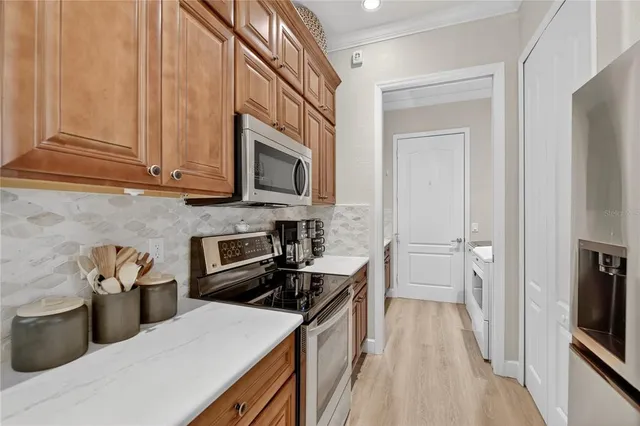 a front view of a house with a yard table and chairs