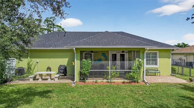 an aerial view of a house with a garden