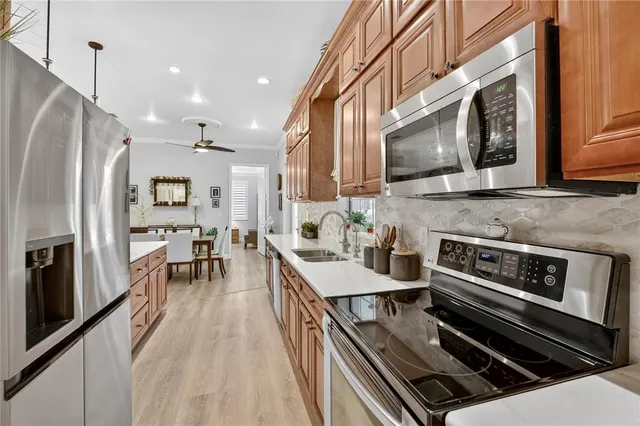 a living room with furniture and flat screen tv
