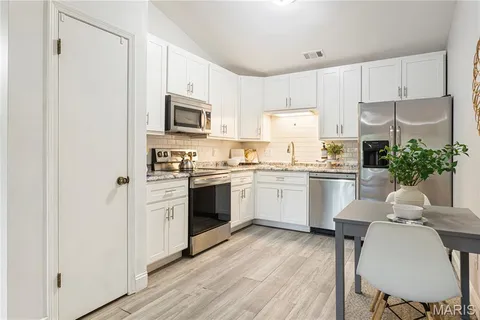 $165,000 | 7519 Triwoods Drive, Unit K, Shrewsbury, MO 63119