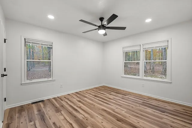 a front view of a house with barbeque