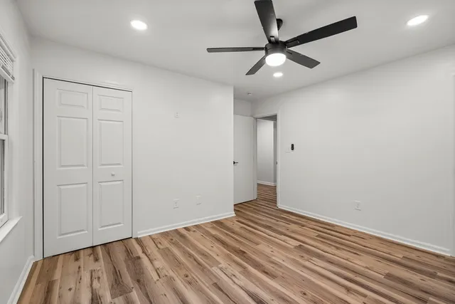 a view of a backyard with trees