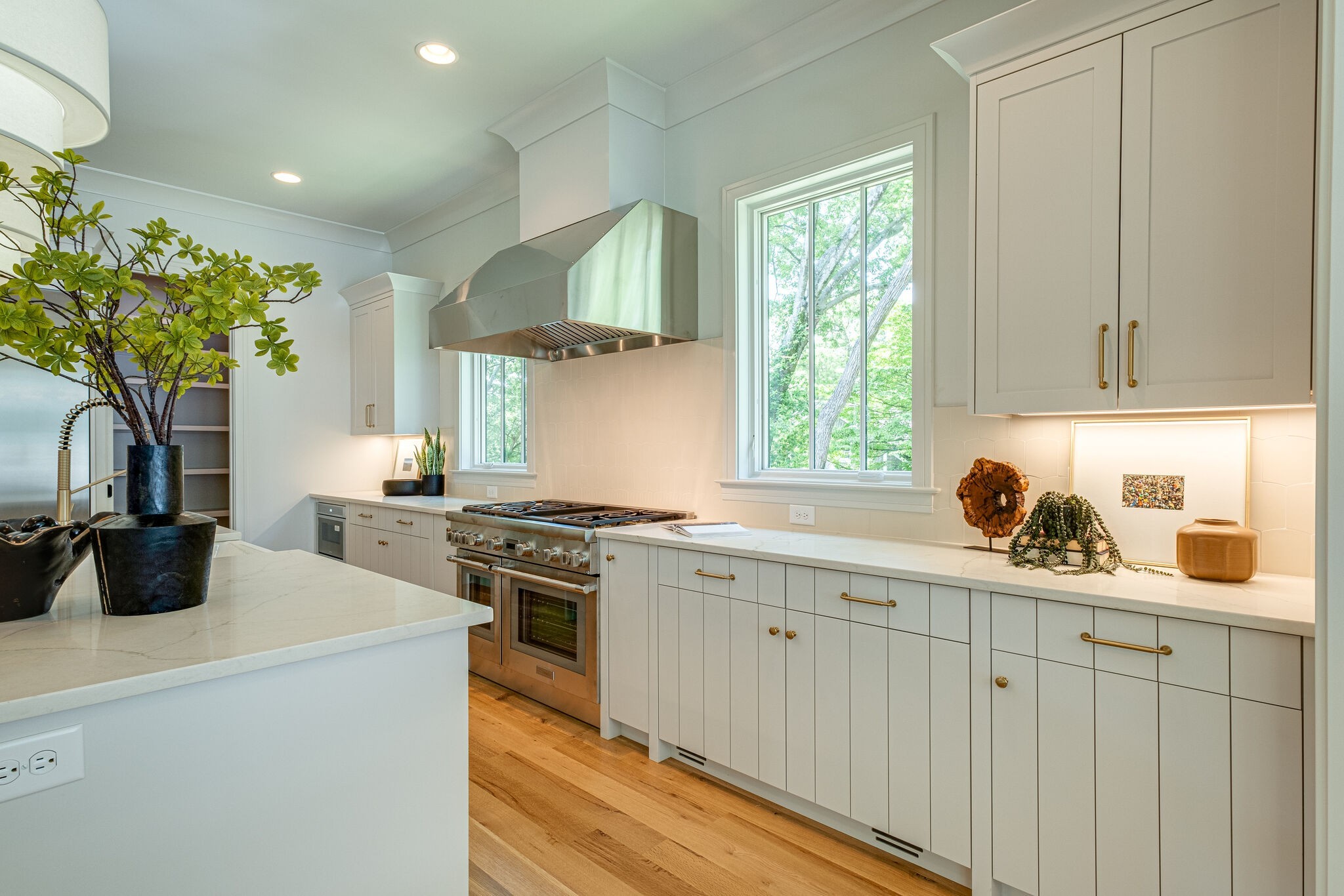 4012 Murphy Road Nashville, TN 37209 - Photo 15 of 63 a kitchen with white cabinets and appliances