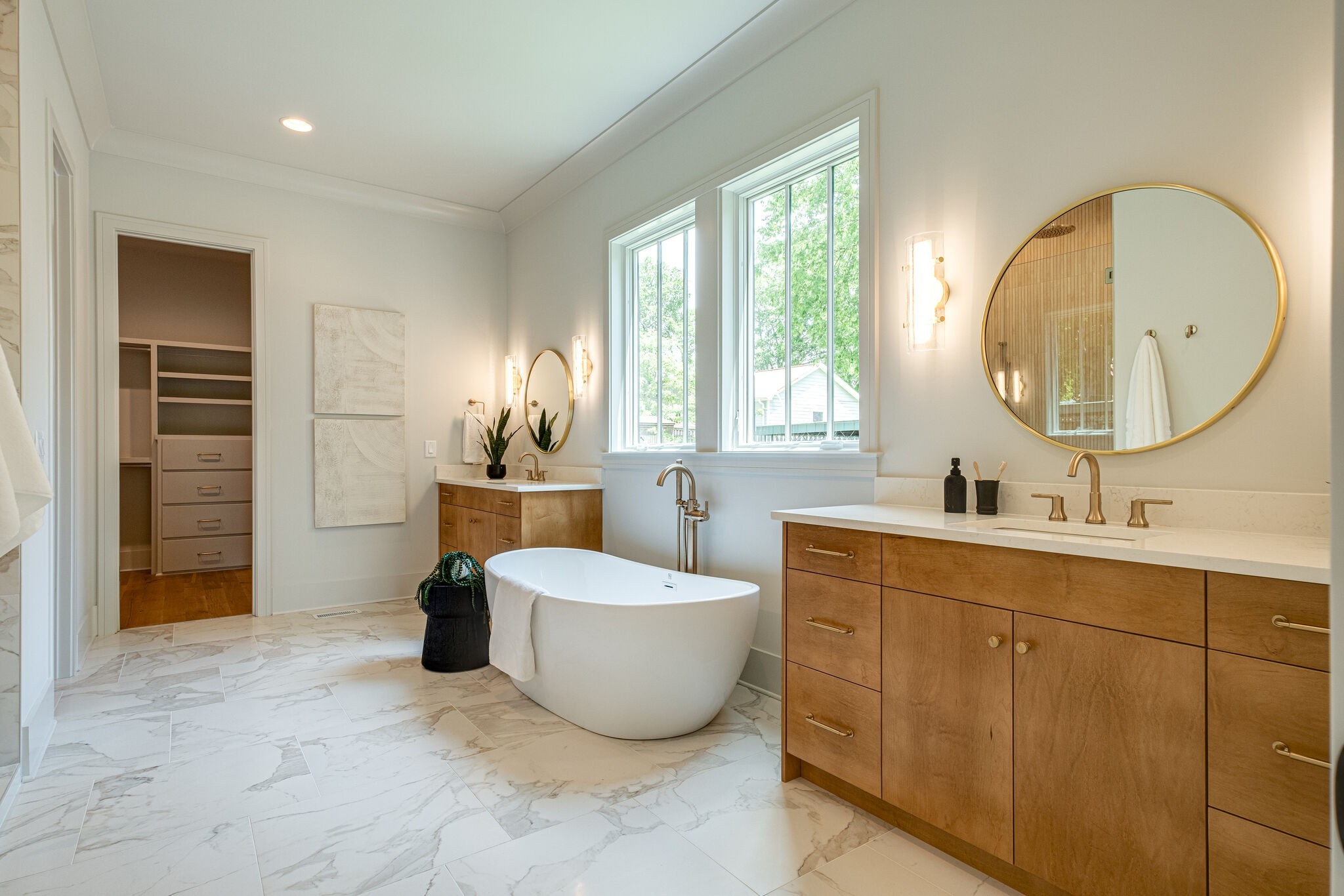 4012 Murphy Road Nashville, TN 37209 - Photo 32 of 63 a spacious bathroom with a double vanity sink mirror and bathtub