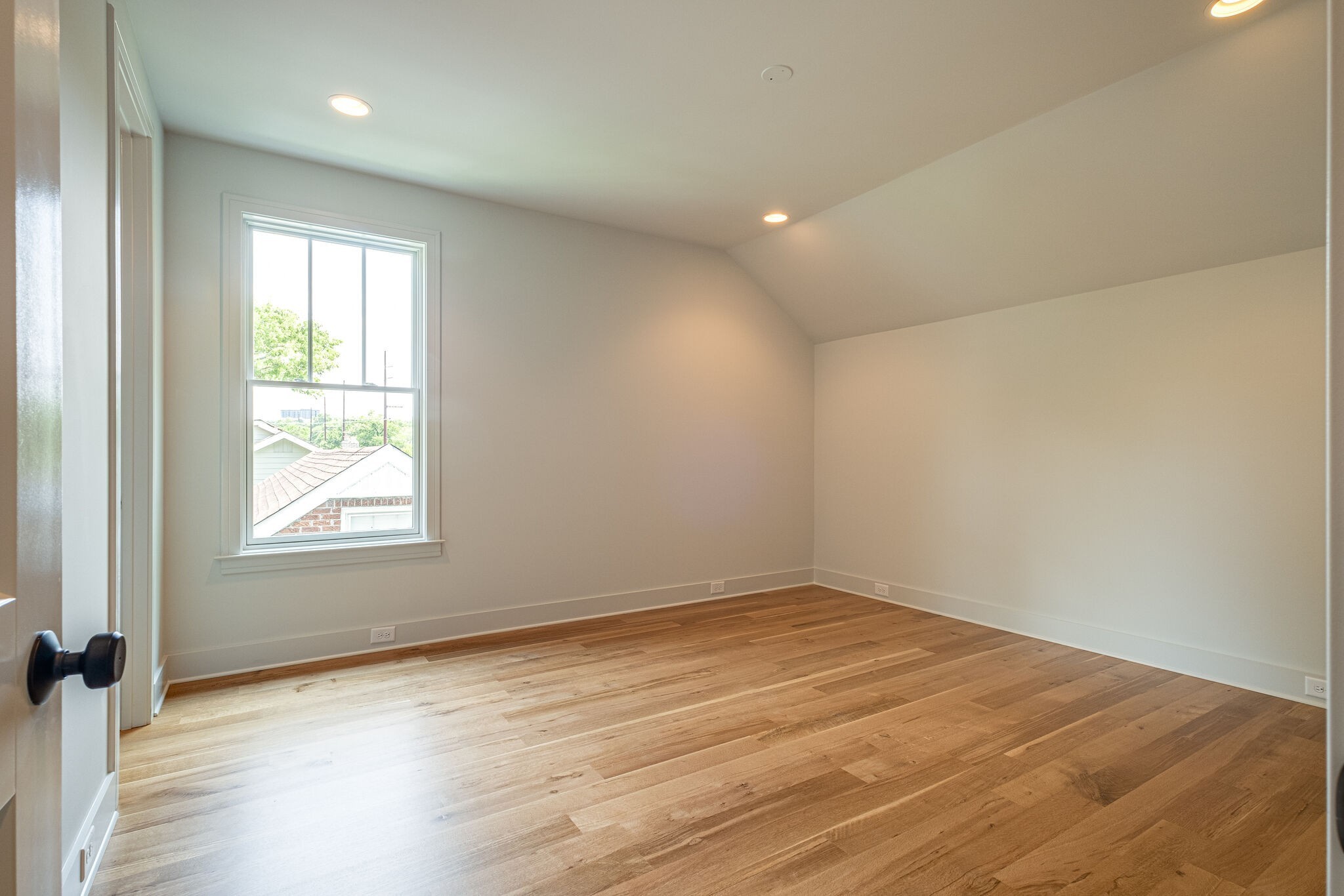 4012 Murphy Road Nashville, TN 37209 - Photo 49 of 63 an empty room with wooden floor and windows