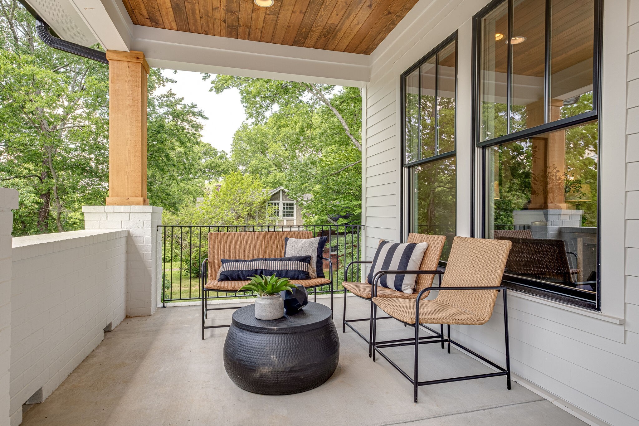 4012 Murphy Road Nashville, TN 37209 - Photo 5 of 63 a view of a chair and tables in the balcony