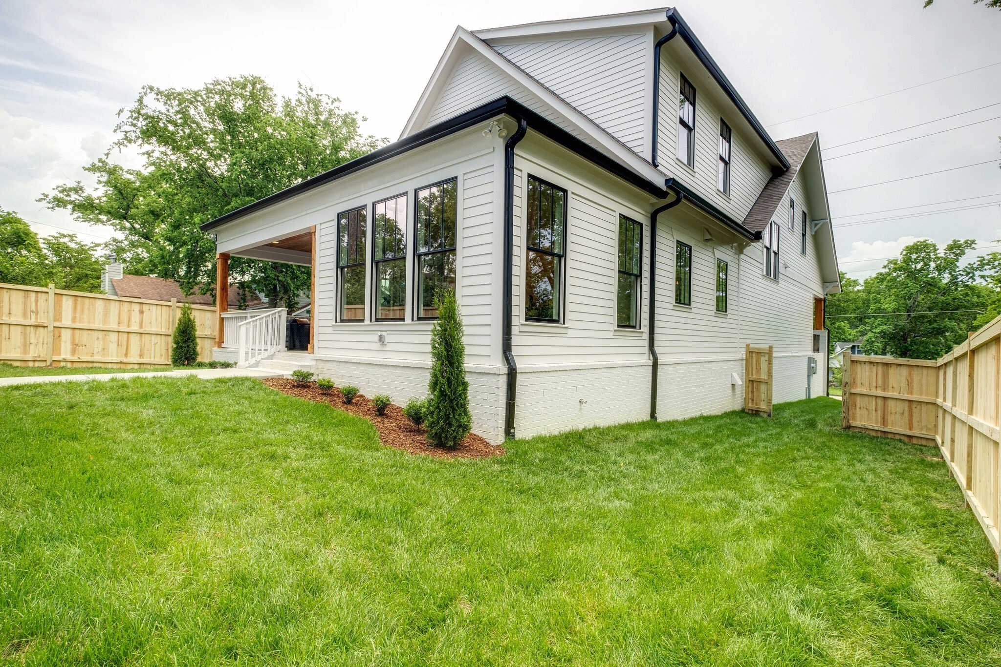 4012 Murphy Road Nashville, TN 37209 - Photo 58 of 63 a view of a house with backyard and garden