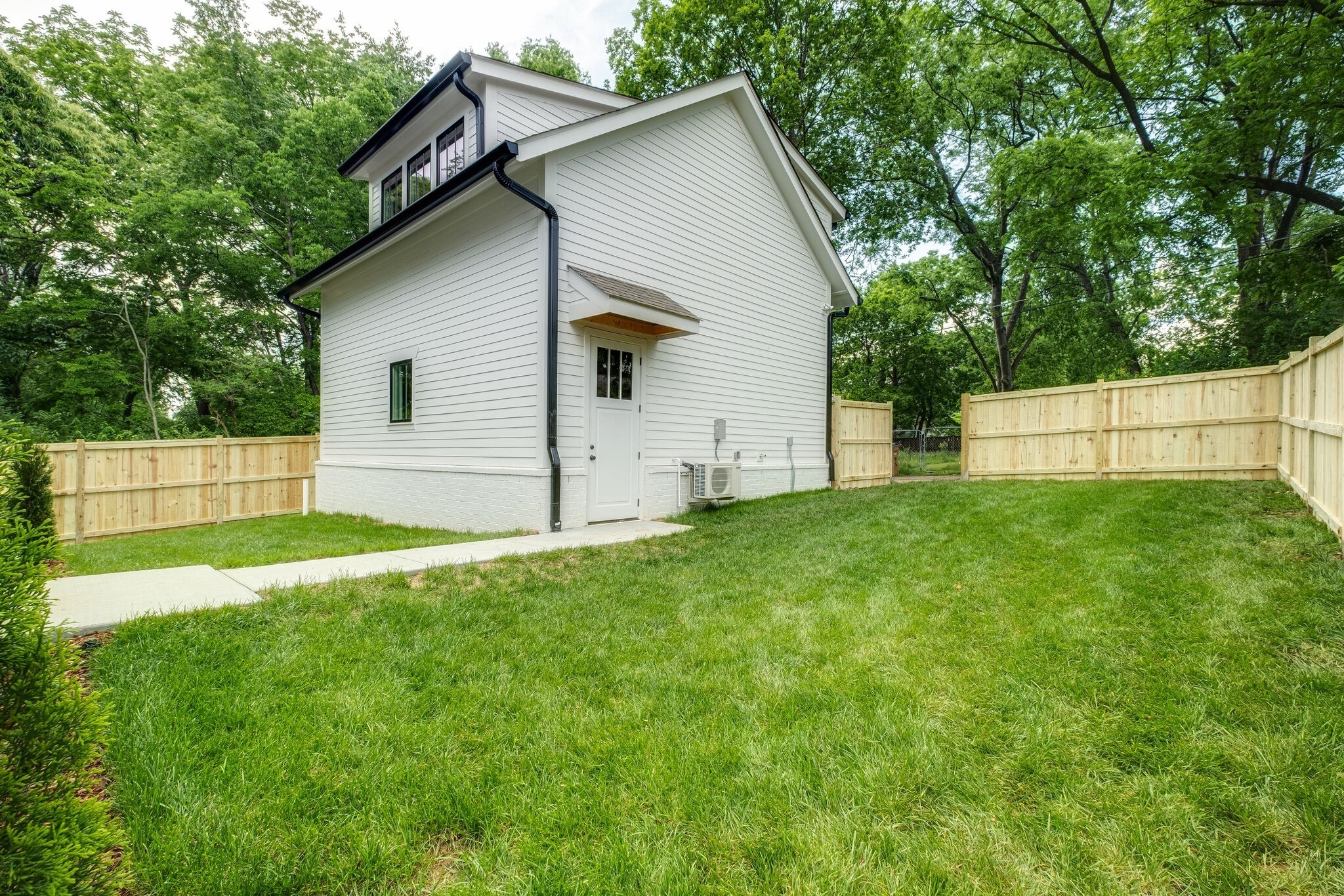 4012 Murphy Road Nashville, TN 37209 - Photo 59 of 63 a view of a backyard with a small cabin
