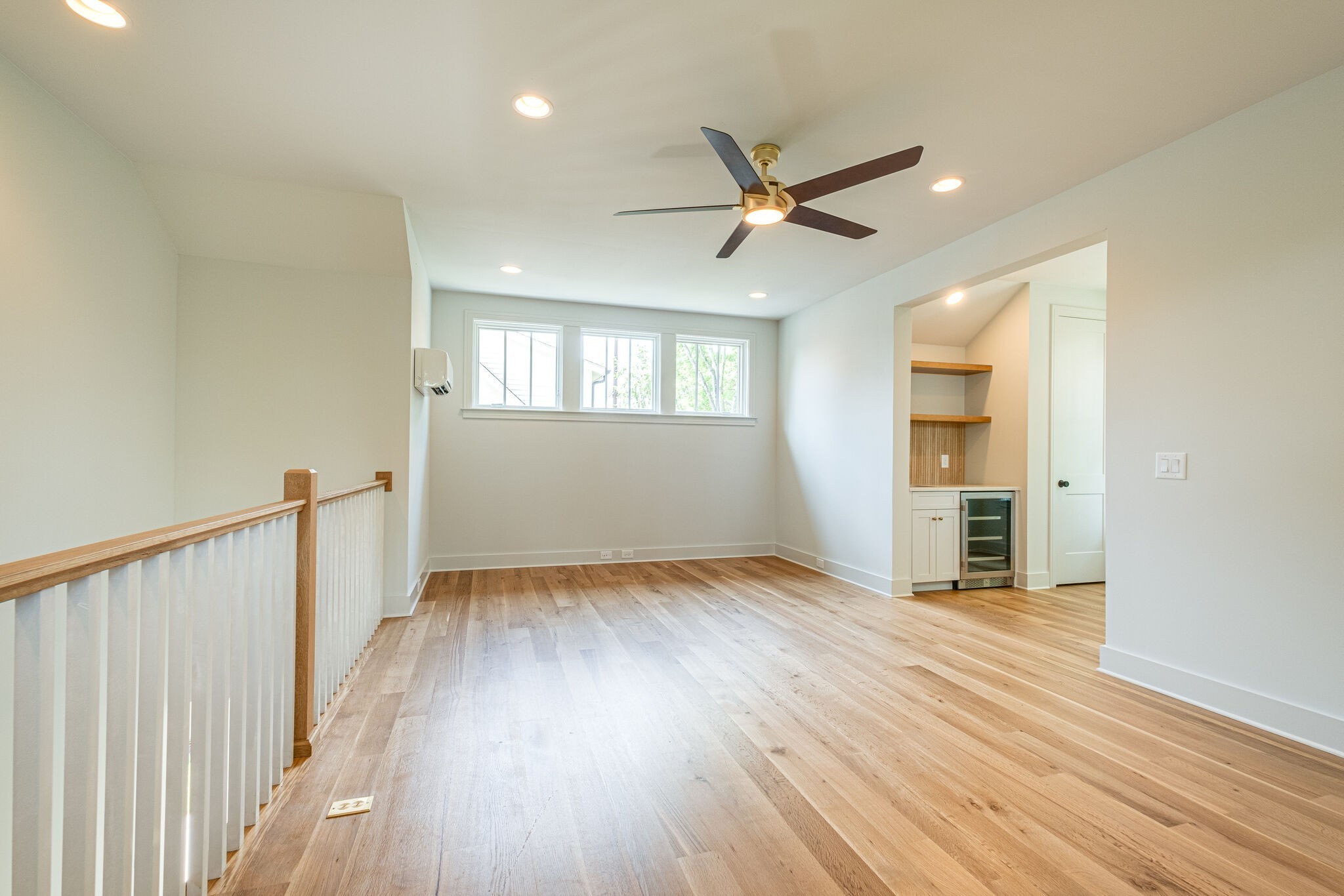 4012 Murphy Road Nashville, TN 37209 - Photo 60 of 63 wooden floor in an empty room with a window