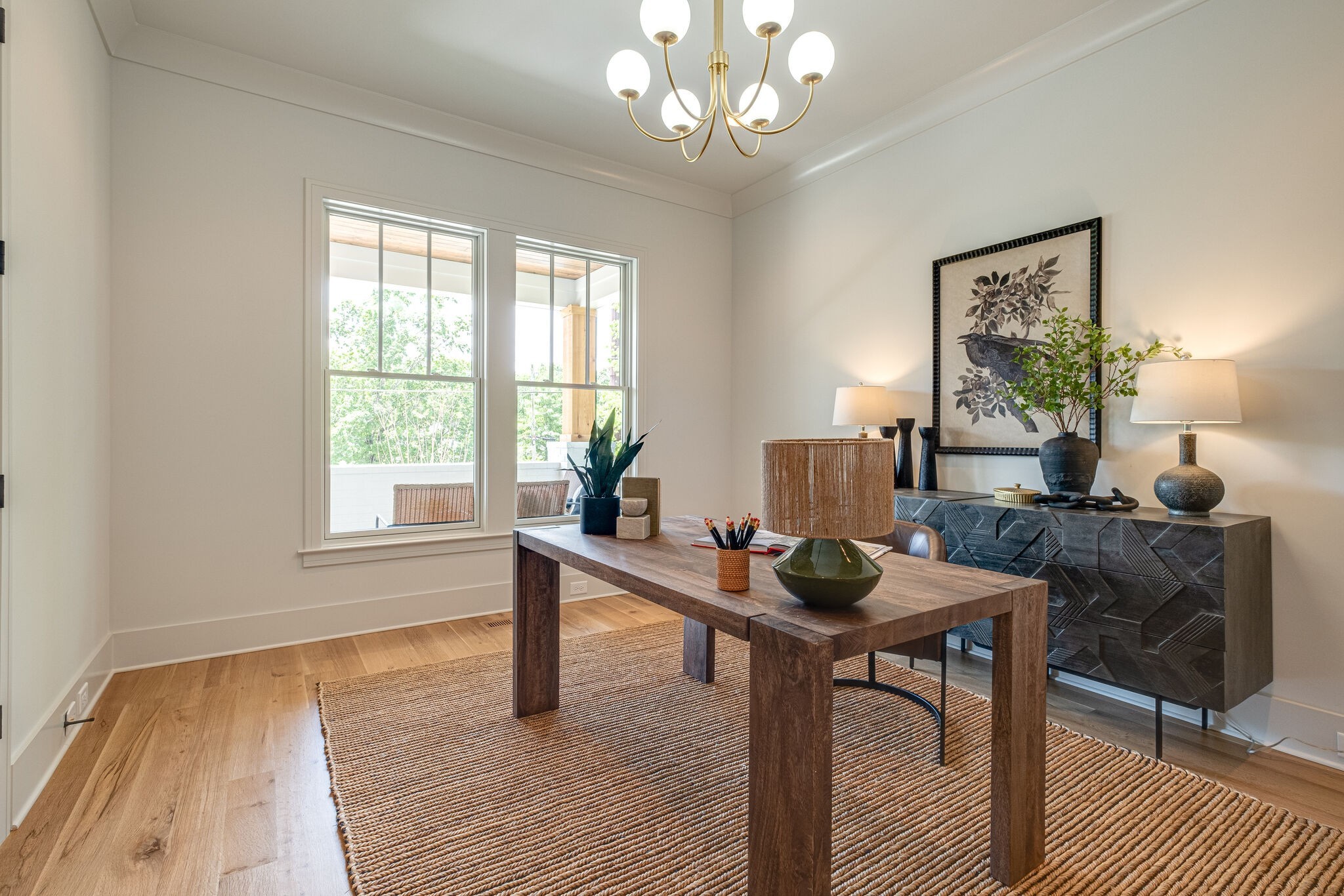 4012 Murphy Road Nashville, TN 37209 - Photo 7 of 63 a workspace with furniture window and wooden floor