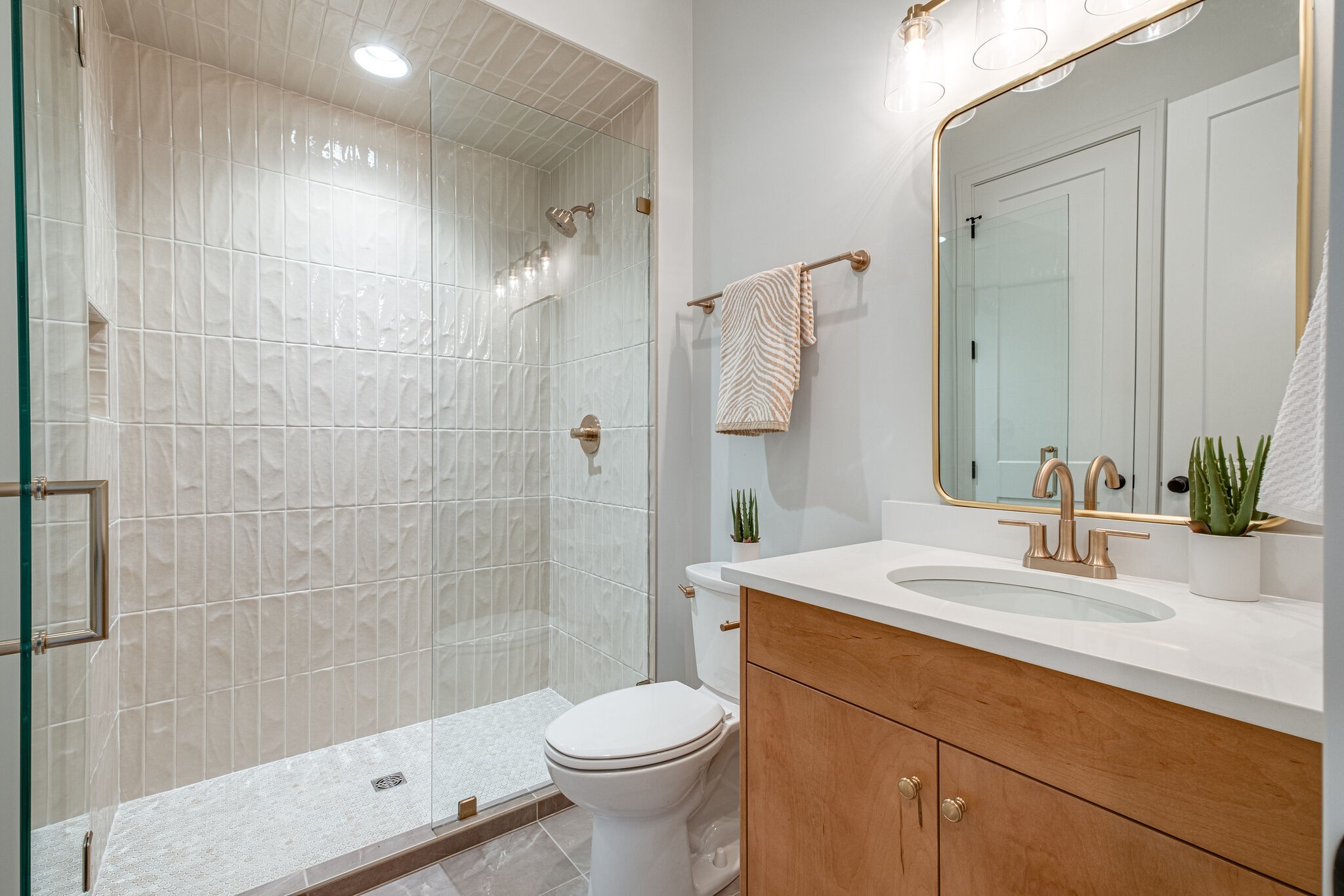 4012 Murphy Road Nashville, TN 37209 - Photo 10 of 63 a bathroom with a sink a toilet and shower