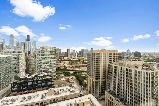 a view of a city with tall buildings