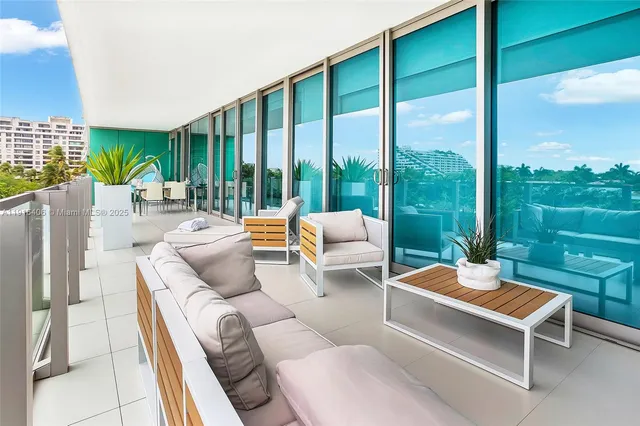 a outdoor living space with furniture and garden view