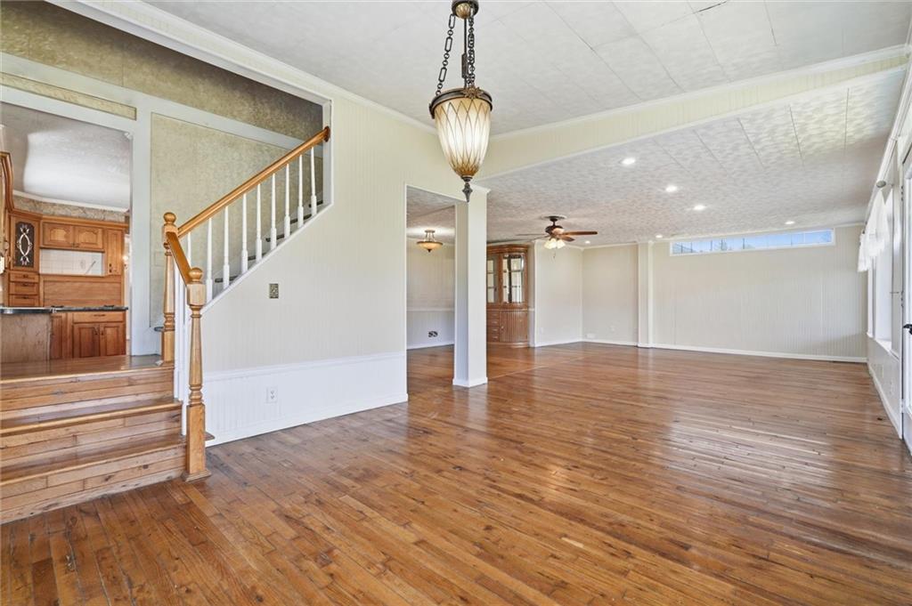 54 Terrace Road Millsboro, PA 15348 - Photo 16 of 49 a view of a room with wooden floor and staircase