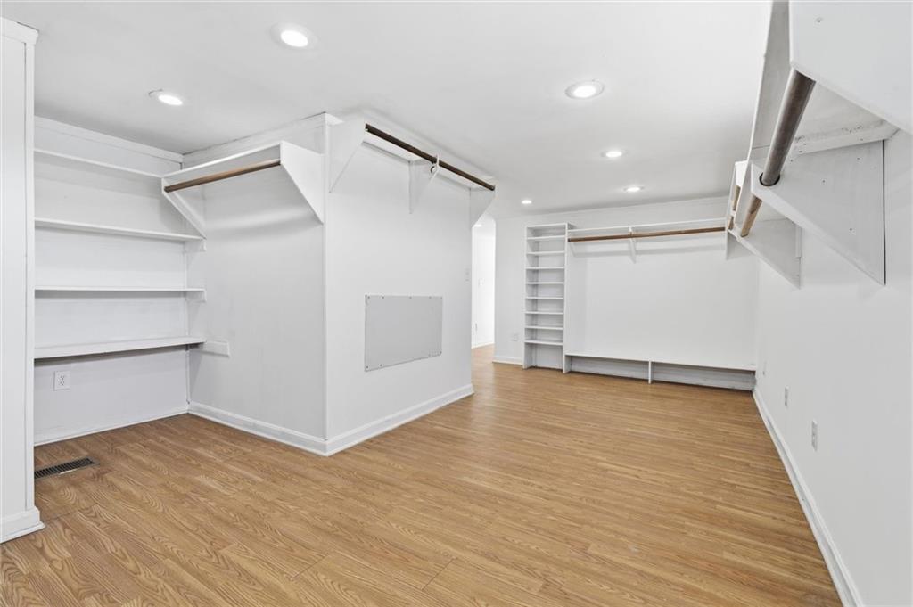 54 Terrace Road Millsboro, PA 15348 - Photo 22 of 49 a view of an empty room with wooden floor and a window