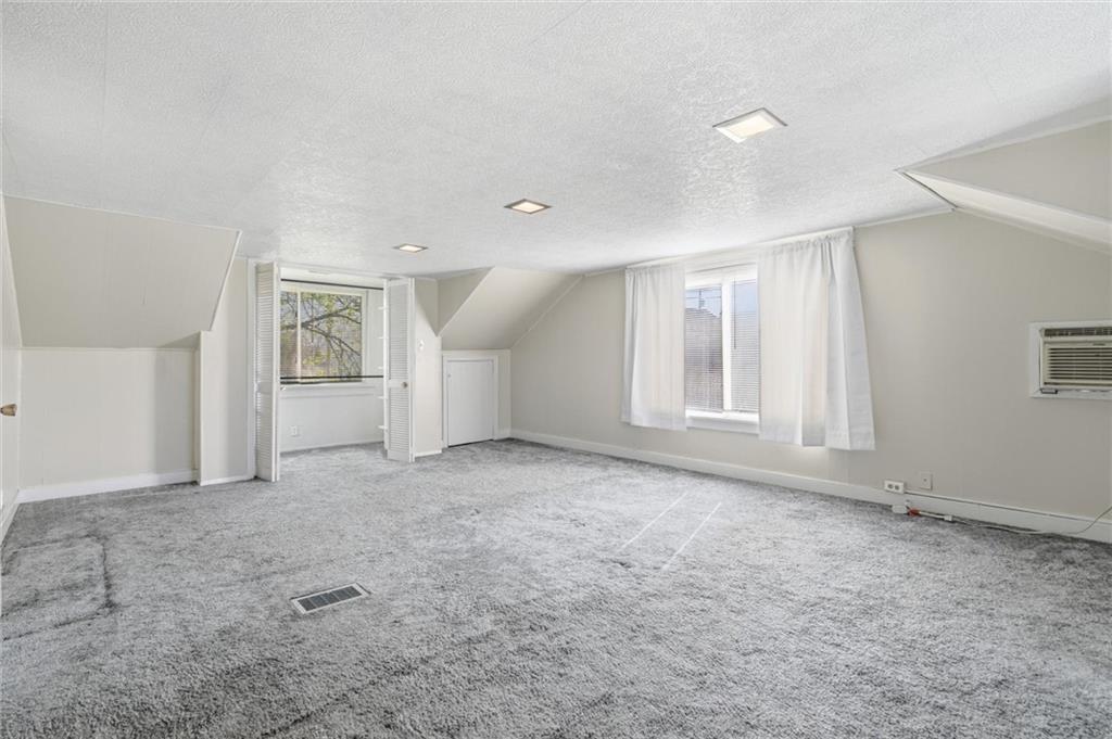 54 Terrace Road Millsboro, PA 15348 - Photo 27 of 49 a view of an empty room with a window