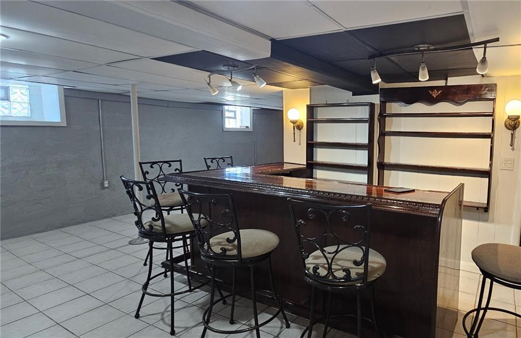 54 Terrace Road Millsboro, PA 15348 - Photo 37 of 49 a kitchen with a table and chairs in it
