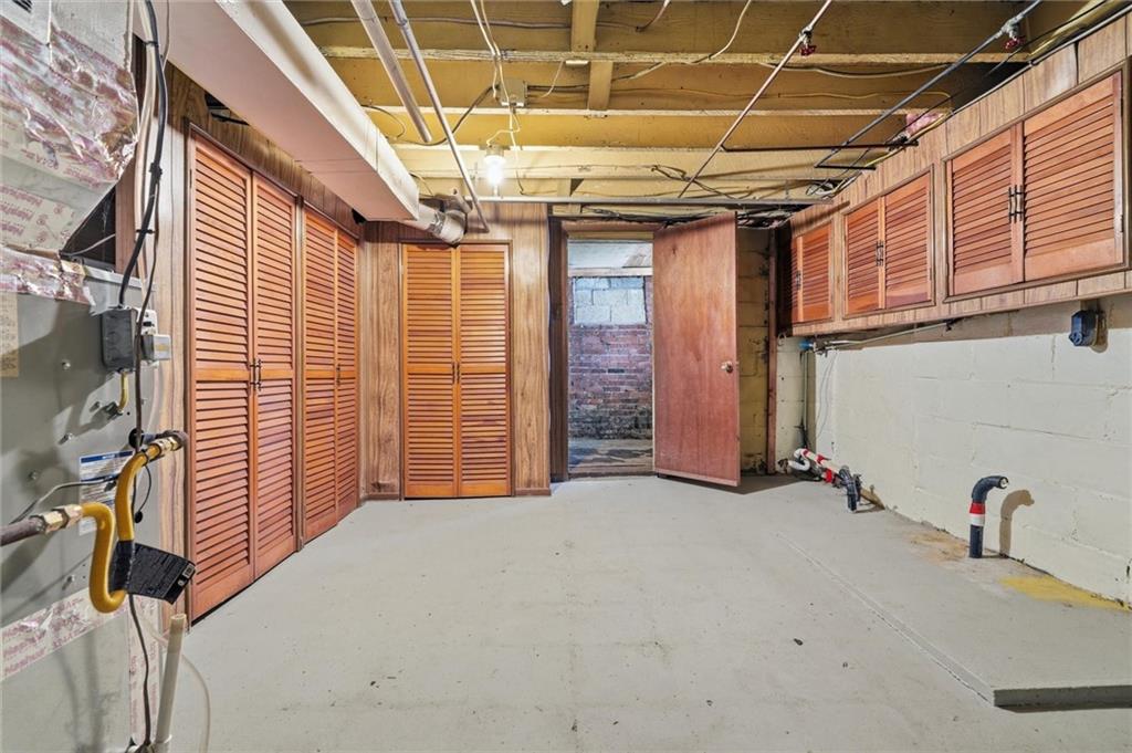 54 Terrace Road Millsboro, PA 15348 - Photo 40 of 49 a view of a storage room with an empty room
