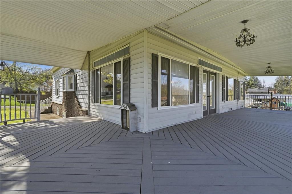 54 Terrace Road Millsboro, PA 15348 - Photo 4 of 49 a view of a house with a balcony