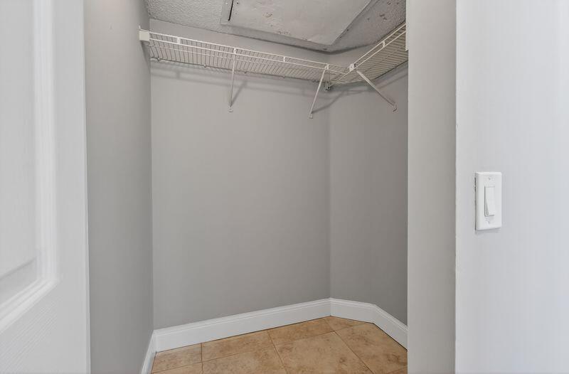 744 Executive Center Drive, Unit 11 West Palm Beach, FL 33401 - Photo 17 of 29 a view of a room with empty racks