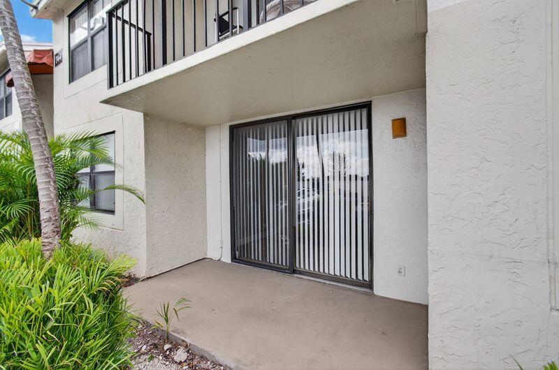 744 Executive Center Drive, Unit 11 West Palm Beach, FL 33401 - Photo 18 of 29 a view of a front door