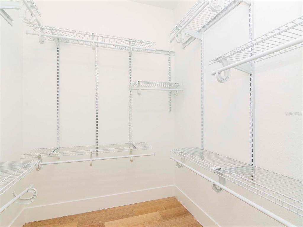 107 South Obrien Street, Unit 118 Tampa, FL 33609 - Photo 19 of 30 a bathroom with a bathtub and a shower