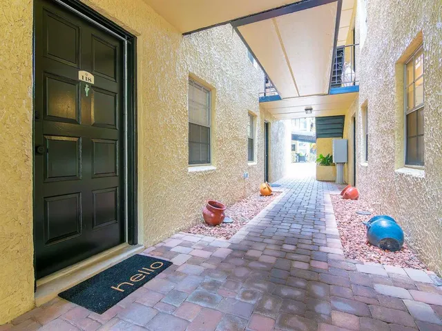 a outdoor space with lots of white furniture