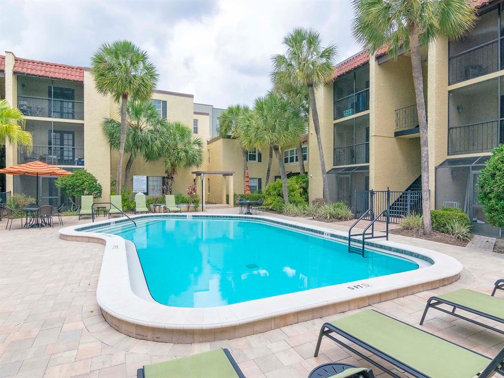 107 South Obrien Street, Unit 118 Tampa, FL 33609 - Photo 28 of 30 a view of outdoor space yard swimming pool and furniture