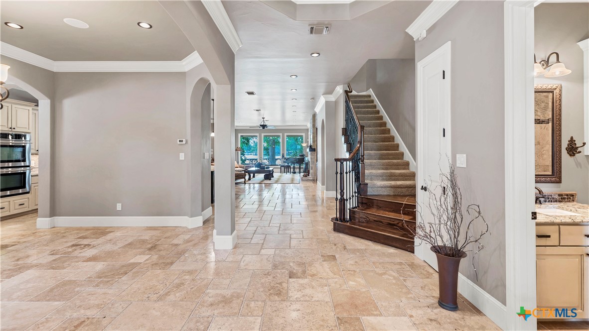 368 Rancho Road New Braunfels, TX 78130 - Photo 4 of 47 a view of entryway with wooden floor
